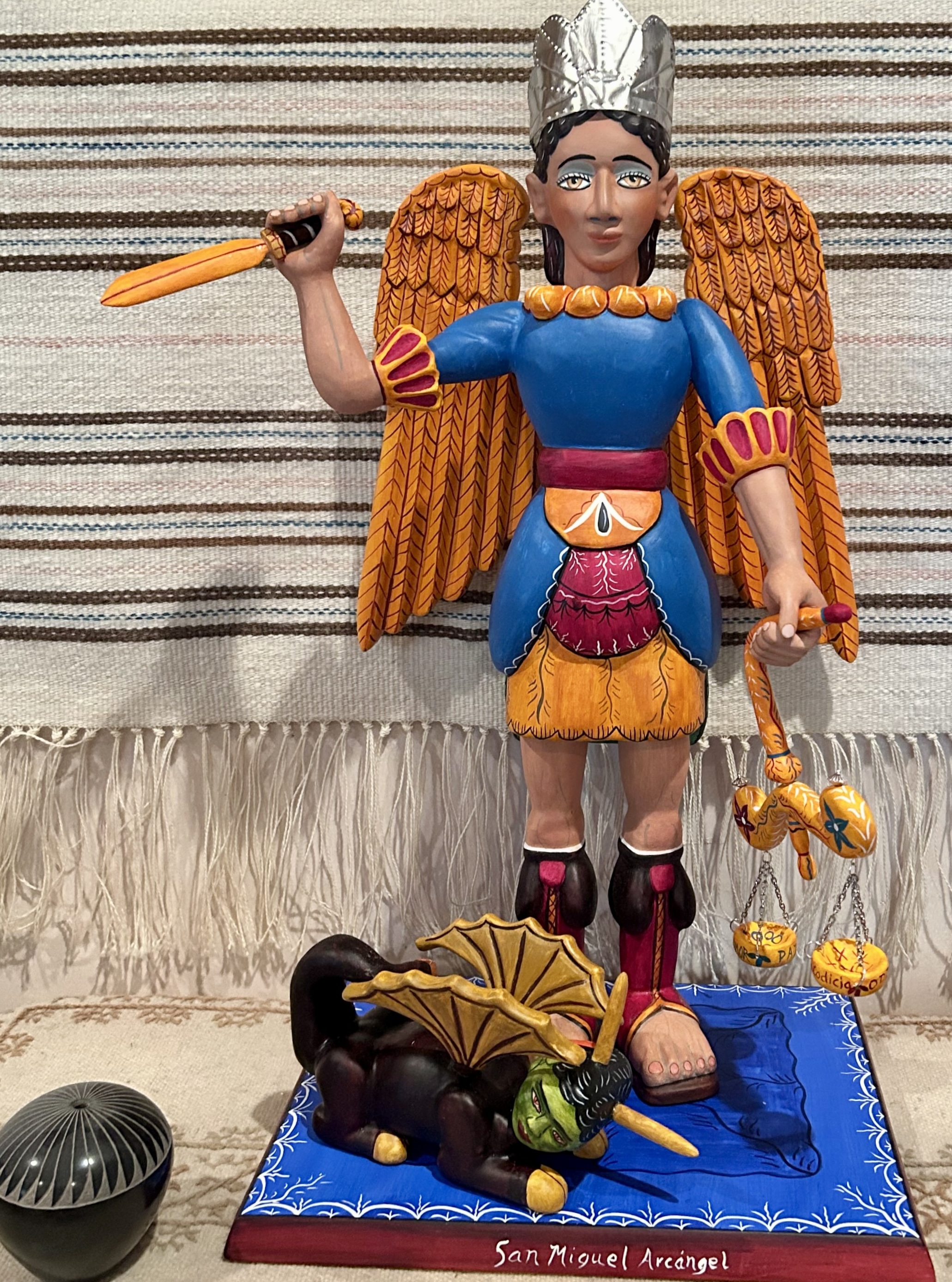 Carved and painted bulto of San Miguel Arcángel by Frank L. Garcia